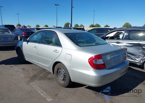 2003 Toyota Camry Le z USA, uszkodzony, nr VIN 4T1BE32K43U194647